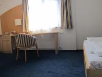 Posteľ alebo postele v izbe v ubytovaní Gastwirtschaft & Hotel Holzinger