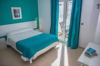 Postel nebo postele na pokoji v ubytování Hostal Victoria Mar