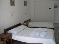Postel nebo postele na pokoji v ubytování Bizas Rooms & Studios