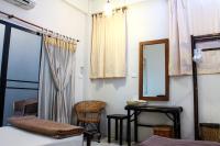 Postel nebo postele na pokoji v ubytování Lamphuhouse Bangkok