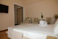 A bed or beds in a room at Olga's Studio