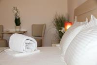A bed or beds in a room at Olga's Studio