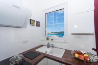 Kuchyňa alebo kuchynka v ubytovaní Villa Anastasia