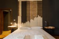 Posteľ alebo postele v izbe v ubytovaní Palazzo Fracastoro