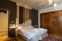 Posteľ alebo postele v izbe v ubytovaní Palazzo Fracastoro