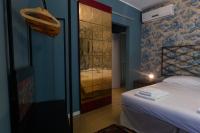 Posteľ alebo postele v izbe v ubytovaní Palazzo Fracastoro