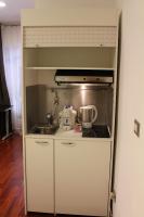 A kitchen or kitchenette at Nel Sole monolocale