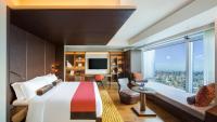 a hotel room with a large bed and a large window at The Prince Gallery Tokyo Kioicho, a Luxury Collection Hotel in Tokyo