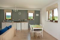 Kuchyňa alebo kuchynka v ubytovaní Apartamenty w Gorach Stolowych