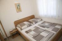 Postel nebo postele na pokoji v ubytování Apartments Šimić