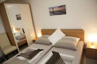 Postel nebo postele na pokoji v ubytování Apartments Šimić