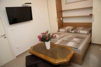 TV a/nebo společenská místnost v ubytování Apartments Šimić