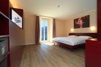 Postel nebo postele na pokoji v ubytování Hotel Elvezia Ascona