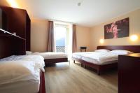 Postel nebo postele na pokoji v ubytování Hotel Elvezia Ascona