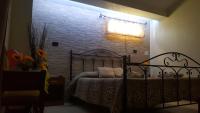 Posteľ alebo postele v izbe v ubytovaní La Casa Dei Sogni
