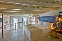 Posteľ alebo postele v izbe v ubytovaní Thalassa Boutique Hotel