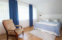 Postel nebo postele na pokoji v ubytování Toila Valgevilla Apartments