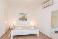 Posteľ alebo postele v izbe v ubytovaní Old Town Hvar