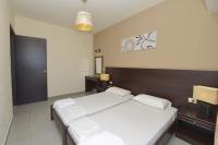 Posteľ alebo postele v izbe v ubytovaní Ialysos City Hotel