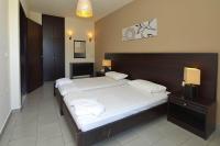 Posteľ alebo postele v izbe v ubytovaní Ialysos City Hotel