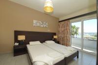 Posteľ alebo postele v izbe v ubytovaní Ialysos City Hotel