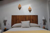 Postel nebo postele na pokoji v ubytování Casa Rural La Coscoja