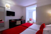 Postel nebo postele na pokoji v ubytování Grupotel Gravina