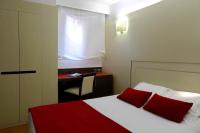 Postel nebo postele na pokoji v ubytování Grupotel Gravina