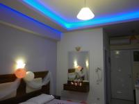 A bed or beds in a room at Zante View Studios & Villas