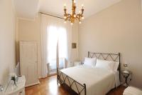 Posteľ alebo postele v izbe v ubytovaní Residenza Borbonica