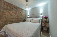 Postel nebo postele na pokoji v ubytování Apartments Fontana
