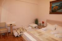 A bed or beds in a room at Olga's Studio