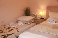 A bed or beds in a room at Olga's Studio