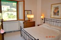 A bed or beds in a room at Casa Isabella