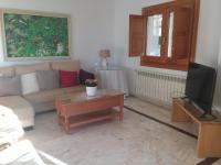 TV a/nebo společenská místnost v ubytování Bonita casa en Barrio de Monachil