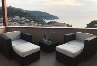 a balcony with two chairs and a table with a view at Meublé Leonetti in Palinuro