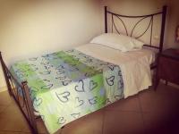 A bed or beds in a room at Al Ciclamino