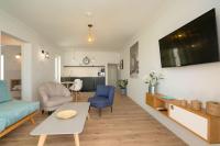 Televízia a/alebo spoločenská miestnosť v ubytovaní La Concha Boutique Apartments - Adults Only