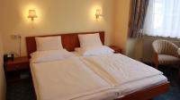 A bed or beds in a room at Hotel Josefa