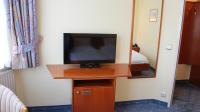 A television and/or entertainment centre at Hotel Josefa