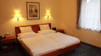 A bed or beds in a room at Hotel Josefa