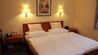 A bed or beds in a room at Hotel Josefa