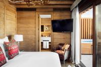Posteľ alebo postele v izbe v ubytovaní El Lodge, Ski & Spa