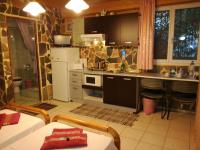 Kuchyňa alebo kuchynka v ubytovaní Apartments Zoumperi