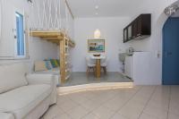 TV a/nebo společenská místnost v ubytování Valena Mare Suites & Apartments