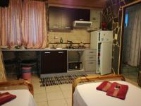 Kuchyňa alebo kuchynka v ubytovaní Apartments Zoumperi