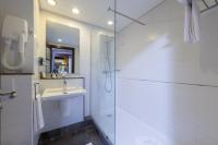 Koupelna v ubytování Le Corail Suites Hotel