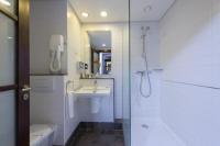 Koupelna v ubytování Le Corail Suites Hotel