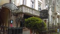 a building with a fence in front of it at Hotel de l&#39;Orangerie in Strasbourg