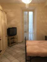 Televízia a/alebo spoločenská miestnosť v ubytovaní WHOLE HOLIDAY HOME APARTMENT SPLENDID CIVITAVECCHIA da Pamino & Priscilla